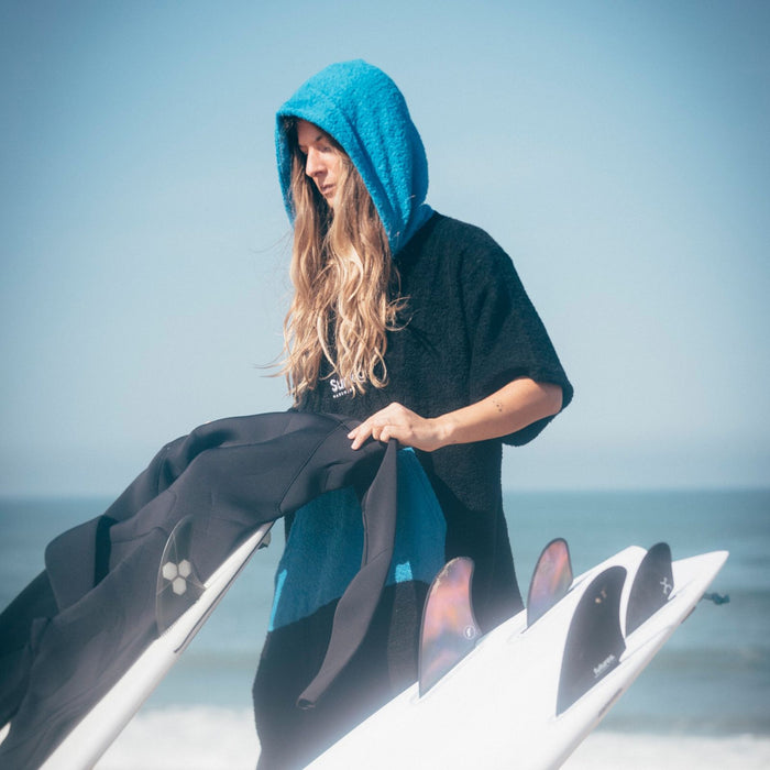 Poncho Negro-Cian Surflogic 59802